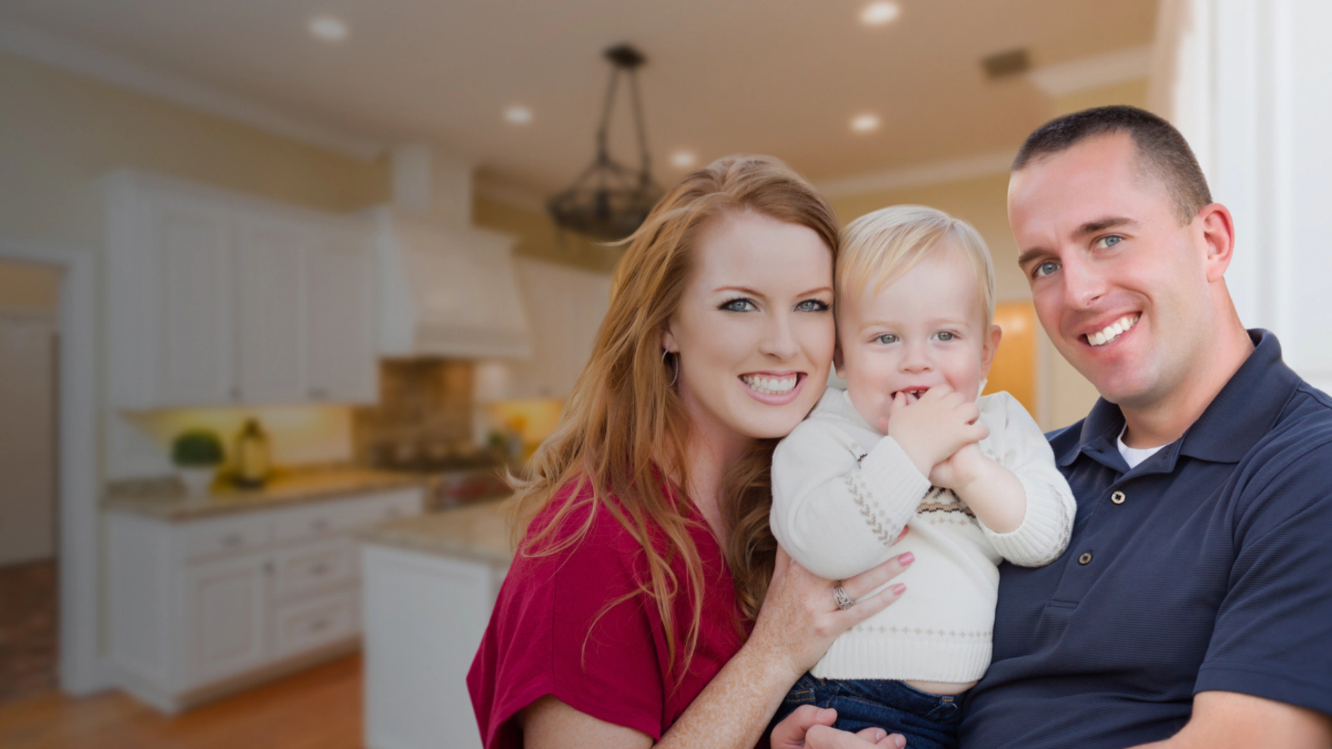 family of three inside a hosue